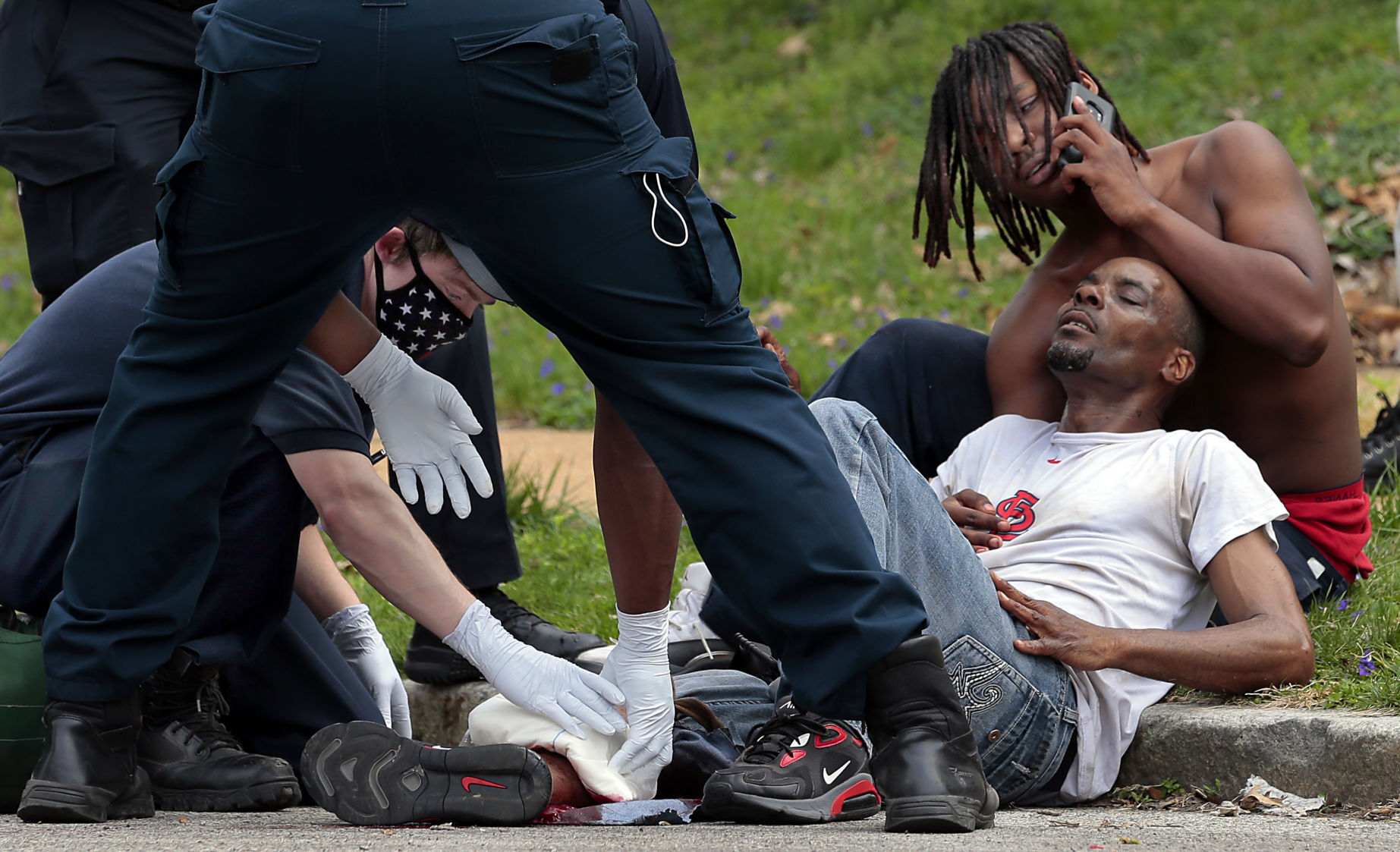 Two men shot blocks away and minutes after third shooting in Wells Goodfellow